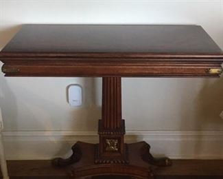 Elegant flip top pedestal table with leather interior