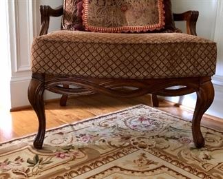 Wood front details of matching upholstered chairs 