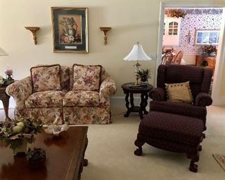 Floral loveseat, nice side tables and straight back chair and ottoman