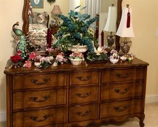 French provincial 9 drawers dresser with large matching mirror.