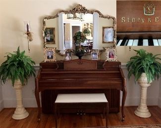 Story & Clark piano, urns with ferns, large gold mirror