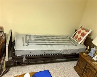 Twin hospital bed with rails