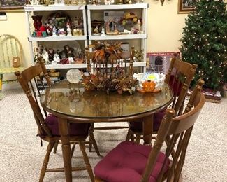 Round wood table with glass top and 4 matching chairs, fall decor, 5ft Christmas tree and lots of great items on the shelves!