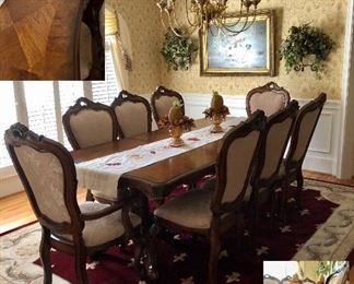 Dining table with 8 upholstered chairs