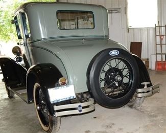 1929 Ford Coupe in good condition,has keys but does need some motor work and repair