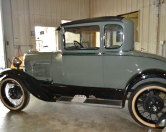 1929 Ford Coupe in good condition,has keys but does need some motor work and repair motor locked up