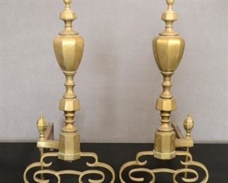 Cast Iron and brass andirons 26 inches tall by 22 and half inches 