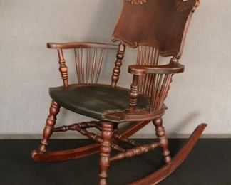 Ornate early 1900's child's rocker possibly Rosewood all original 33 by 32 and a half by 23 and half