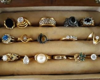 Various gold and gold  costume rings