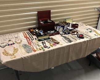 Table full of costume jewelry
