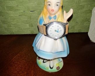 $20 VINTAGE 1960S ALICE IN WONDERLAND FIGURINE WITH WATCH