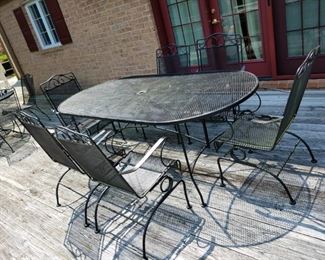 heavy metal table with 6 bouncy chairs