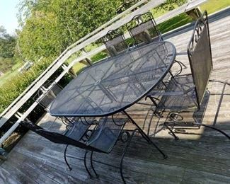 heavy metal table with 6 bouncy chairs