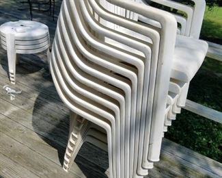 10 resin chairs with 4 small tables