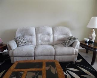 Cream microfiber Sofa with reclining ends, Electric, from Family Furniture in Leesburg