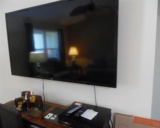65" Smart  TV by Samsung.. Wall Mount not included.  Have original stand.