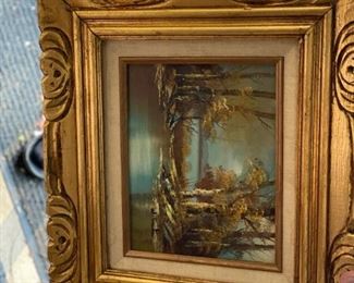 artwork with gold embellished frame