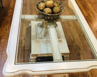 Glass top distressed wood coffee table