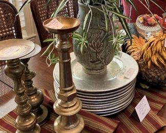 Brass candle sticks; silver charger; vase and greenery