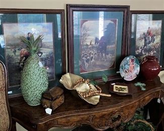 Sofa table; hunt scene framed art