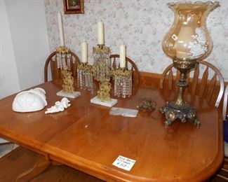 dining room table with 4 chairs, vintage lamp, antique candle holder with crystal