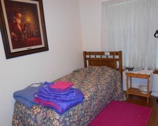 Christmas picture, side table, motorized single hospital bed,  beddings