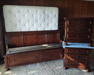 Like new Walter of Wabash king size bedroom suite – – king bed and frame with drawers, and two nightstands with electric hookups for charge ports