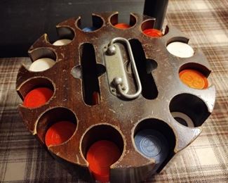 Vintage wooden poker chip caddy with chips