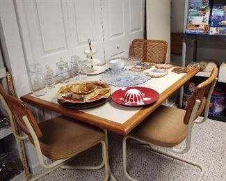 Golden girls era formica and wood and rattan dining set with one leaf and 4 chairs