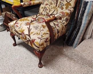 Very well-loved crewel work upholstery chair