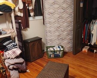Twin mattress, vintage hamper, vintage vinyl weave trunk, his and hers Jamaican shirts