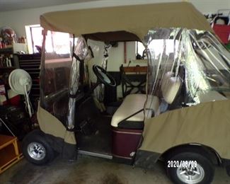 ezy go golf cart w/added seats on back and cover
