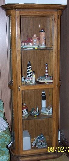 Lighted curio cabinet, lighthouses from Lefton w / boxes