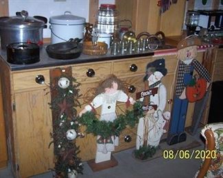 Old pickle jar, Cast iron pans including Griswold and Wagner, pressure cooker, Enamelware and wood Holiday decorations