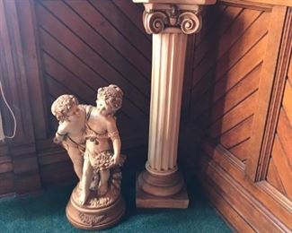 Ceramic statue and pedestal.