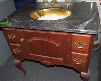Heritage Vanity with marble counter and gold embellished sink/faucet -- $675