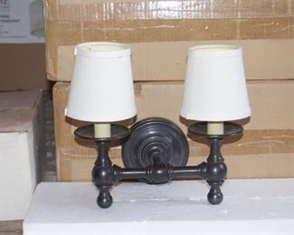 $75 -- 5" x 9" wall sconce with shades. Seven are available. New in box.