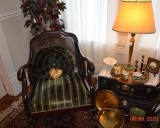 Antique cane back rocker
Antique suit cases
Vintage lamp
Vintage brass