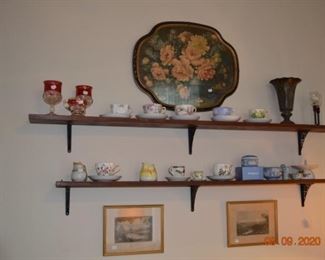 Antique cup and saucer sets
Wood and wrought iron shelves
Wedgewood China