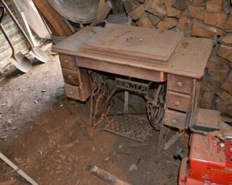 Antique singer sewing machine cabinet