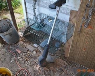 Live traps and weed eater