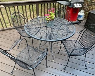 Wrought iron patio table and chairs