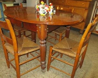 drop leaf table with 4 leaves, set of 8 rush seat chairs