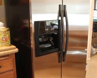 #29 $200.00  Whirlpool side by side refrigerator