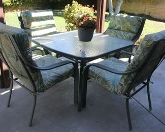 #97 $60.00 Patio table with 4 chairs Table 27”h X 41.5” X 41.5” 