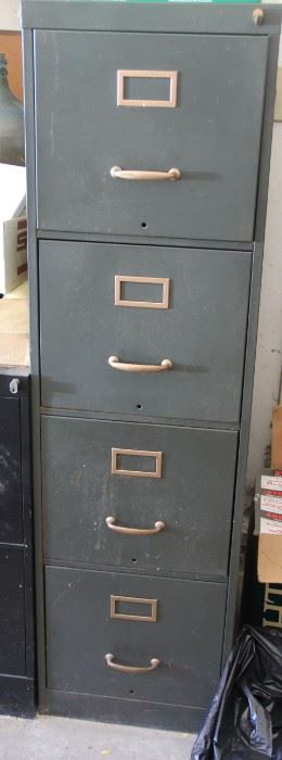 #106 $25.00 Tall file cabinet 
