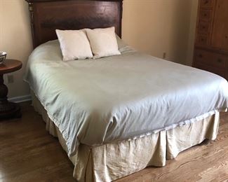 BED AND ANTIQUE HEADBOARD