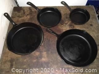 Three Wagner cast iron skillets and one no name