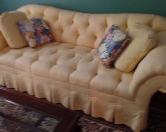 yellow sofa as is  ,  spot on cushion  $225