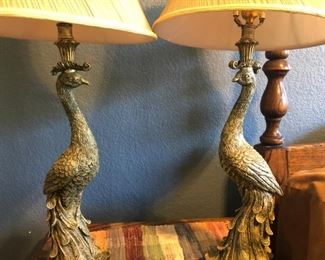 Beautiful pair of peacock lamps with lined shades.